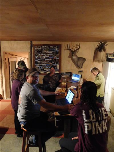 Reviewing the hunting photos